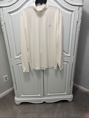 Greg Norman Collection Cream Mock Neck Top with Subtle Shark Embroidery